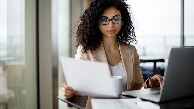 Woman Reviewing Work 