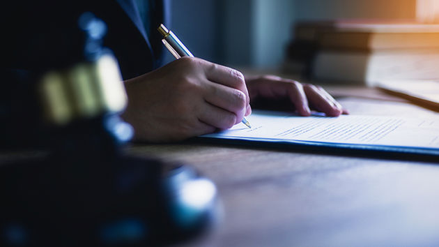Signing A Paper 