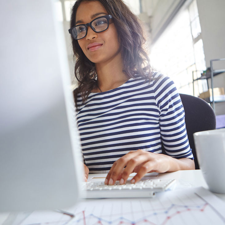 Woman Viewing Desktop Computer 