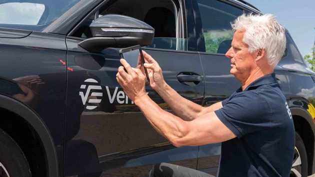 a day in the life - image of man working on a car