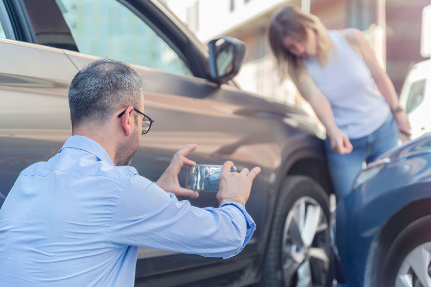 Taking Photo Of Auto Collision Damage On Phone 