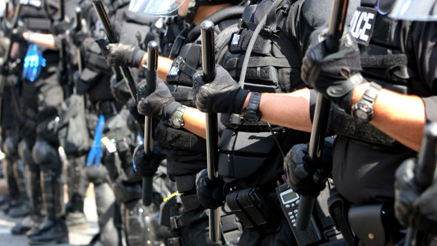 Security Personnel Hands Holding Rifles 