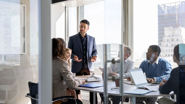 Colleagues In Conference Room 