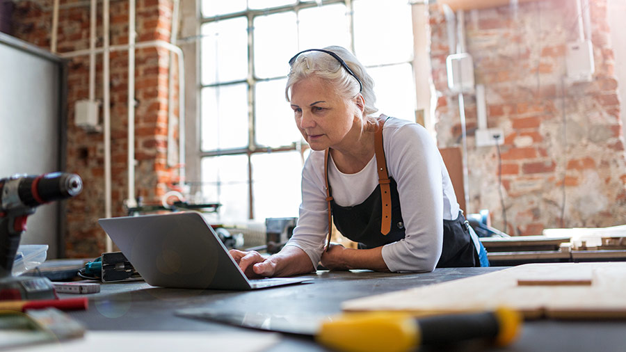 woman-in-workshop-looking-at-computer