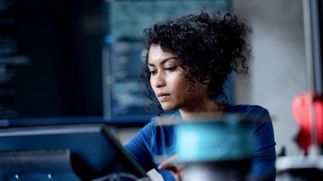 Woman Working At Desk 