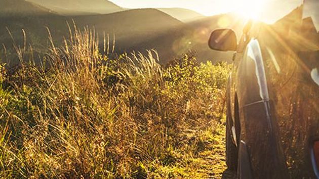 Car On Mountain Peak 