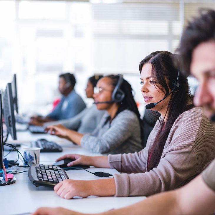 Colleagues In Headsets 