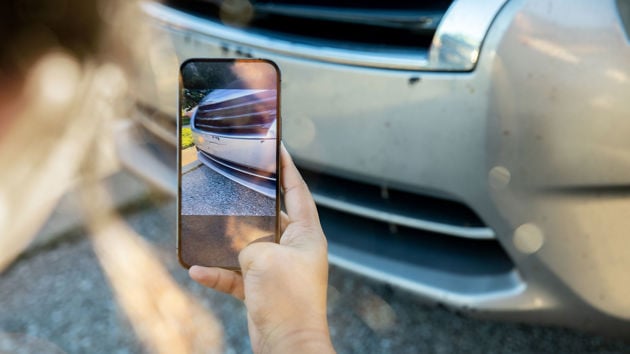 Taking Photo Of Car Damage 