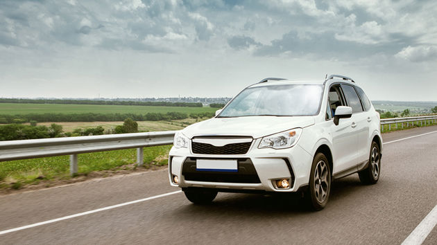 Compact Suv On Rural Road 