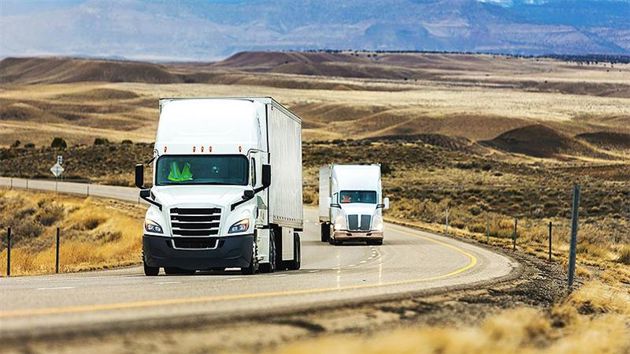 Semi Trucks On Open Highway 