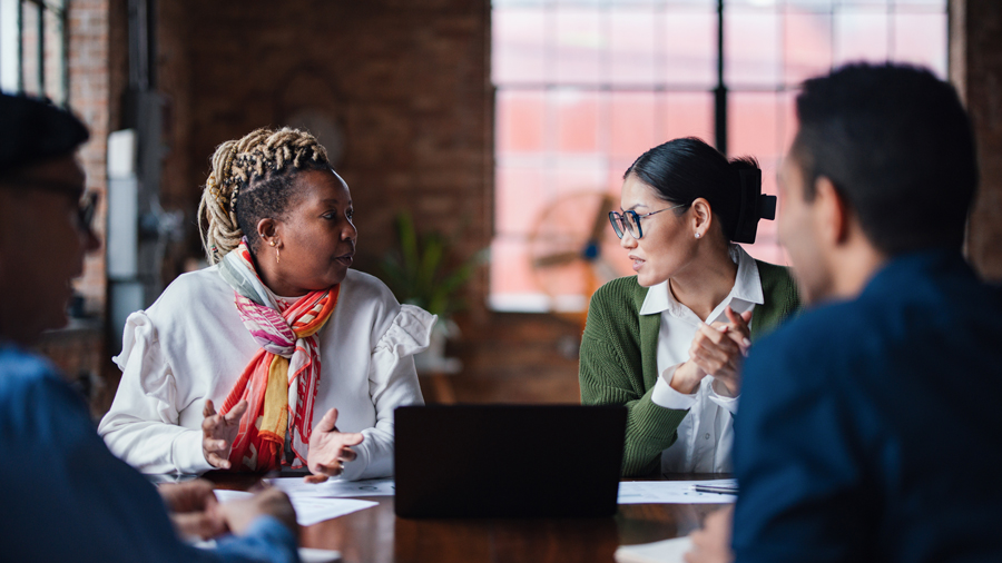 coworkers-in-discusssion-at-table