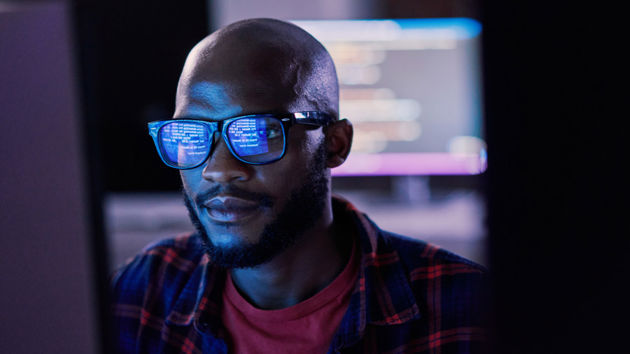 Man Looking At Computer Monitor 