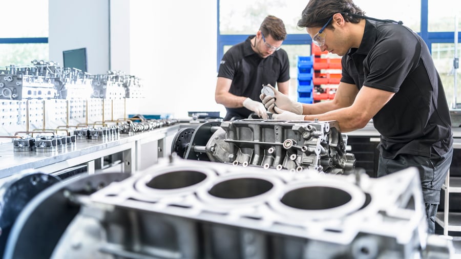 mechanics-working-on-engines