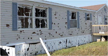 Hail damaged house